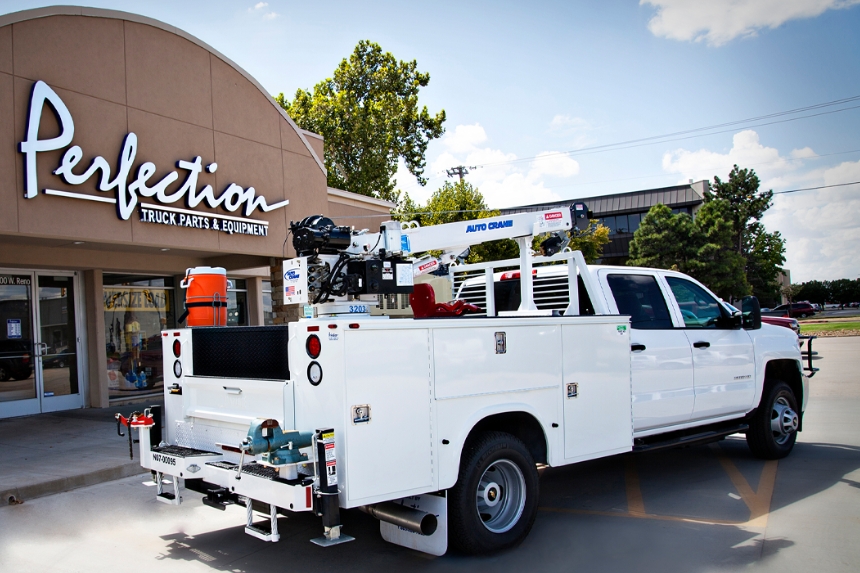 Utility truck outside of Perfection Equipment building